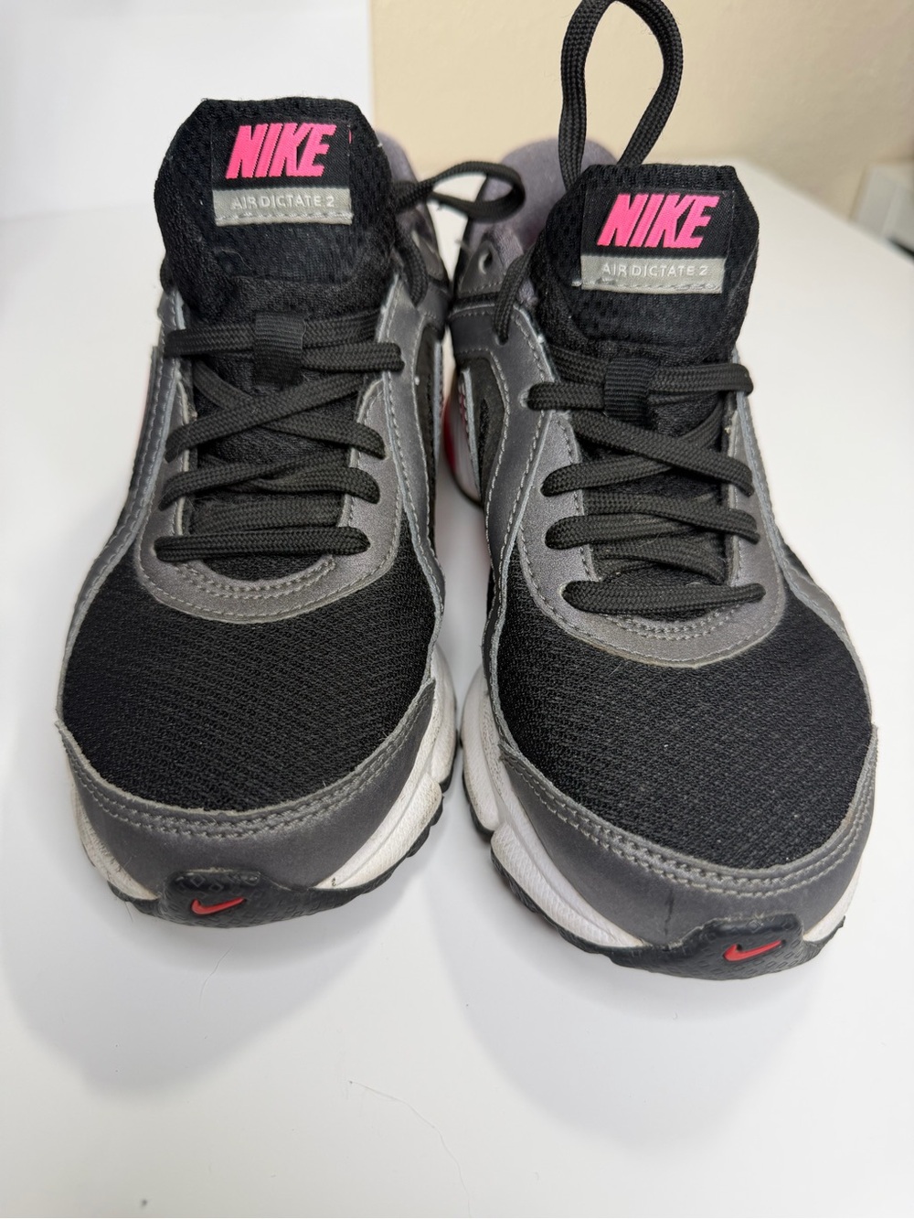 Nike Black and Gray Athletic Sneakers with Pink Logo Accents